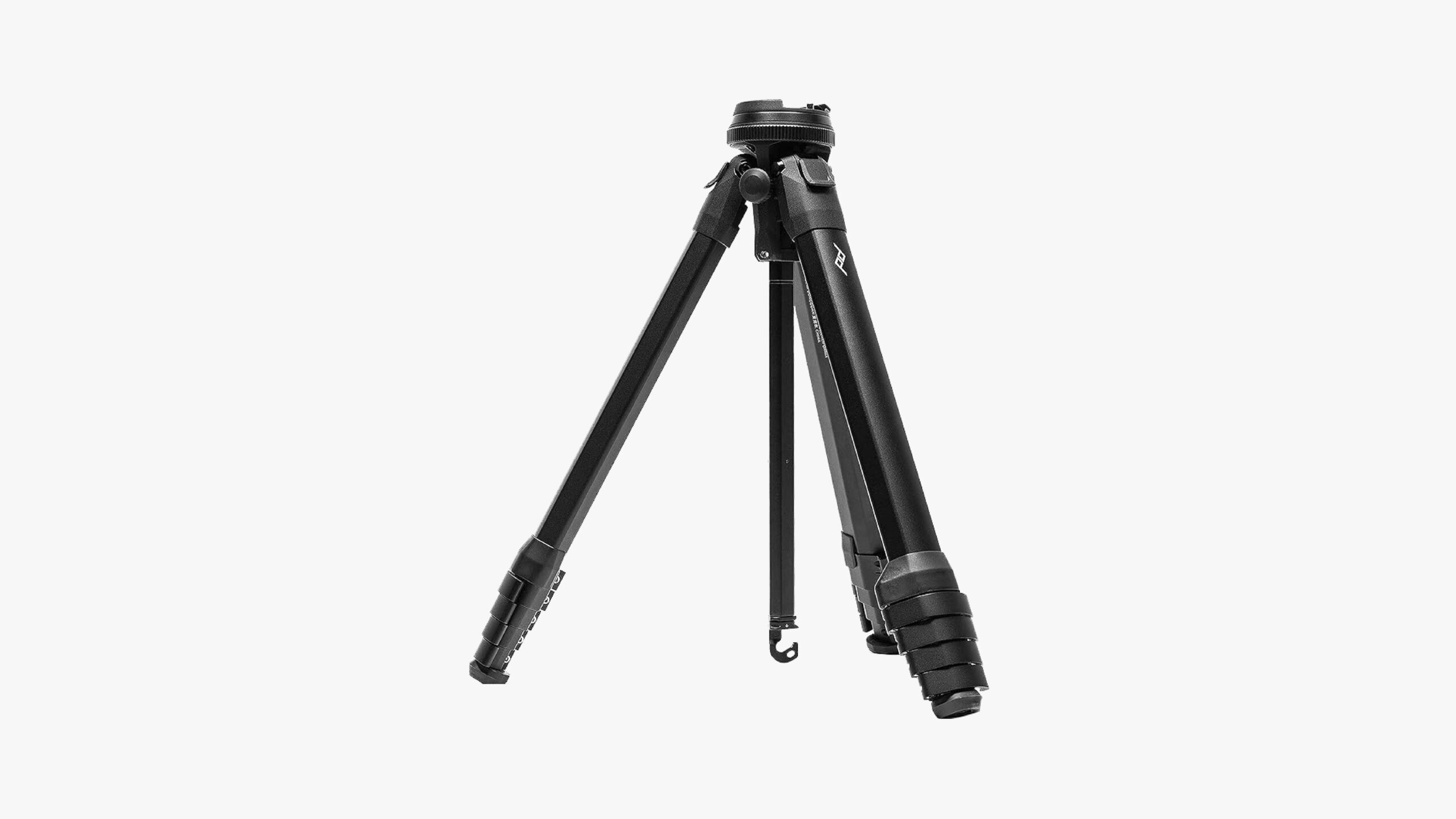 Image of a Peak Design tripod placed over a gray background.